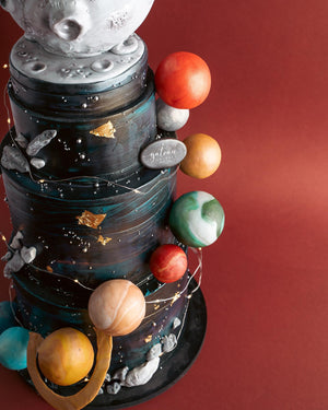 3Tier Outer Space Theme Fondant Cake with Rotating Topper featuring colorful planets and a detailed design