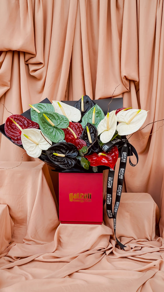 Elegant National Day flower bouquet featuring vibrant anthuriums in a stylish box from Gateau Gourmet Cafe