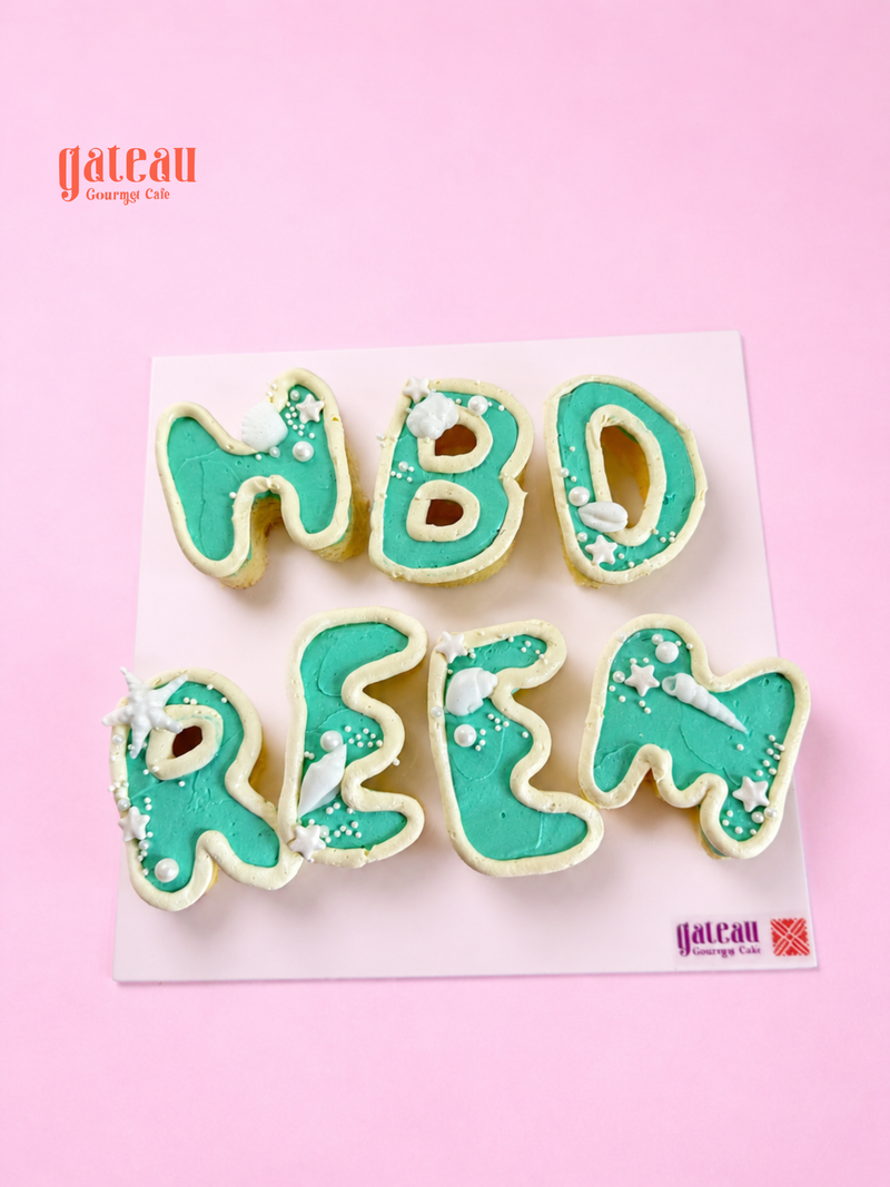 Nano Letter Cake — handcrafted by Gateau Gourmet in Abu Dhabi