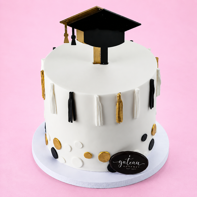 Black-White & Gold Graduation Cake — handcrafted by Gateau Gourmet in Abu Dhabi
