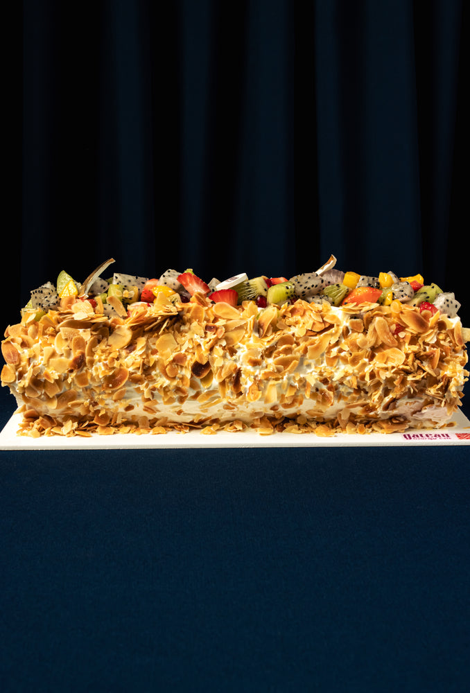 Almond Swiss Roll With Mixed Fruits