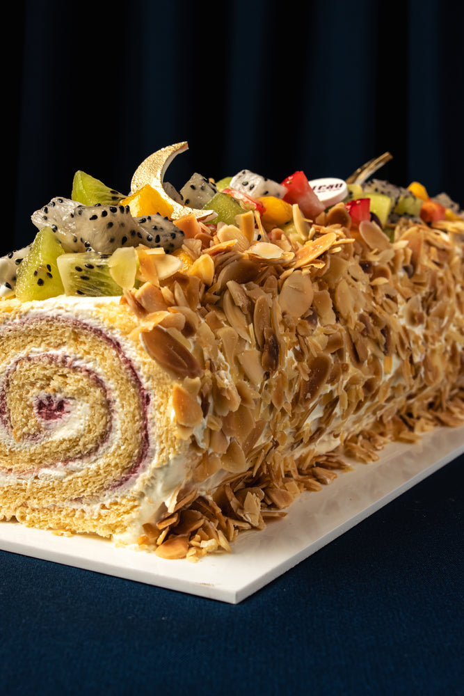 Almond Swiss Roll With Mixed Fruits