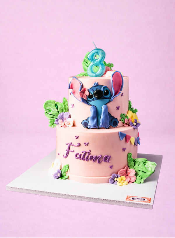 Pastel Hibiscus and blue alien Theme Cake — handcrafted by Gateau Gourmet in Abu Dhabi