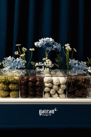 Assorted Arabic treats w arrangement in a decorative display by Gateau Gourmet Cafe