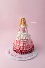 Gateau Gourmet Cafe Barbie birthday cake with pink ombre ruffled dress and doll topper
