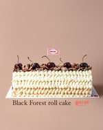 Black Forest Swiss roll cake with cherries and chocolate cream by Gateau Gourmet Cafe
