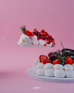 Slice of Gateau Gourmet Cafe bavlova with fresh strawberries and berries to buy bavlova online