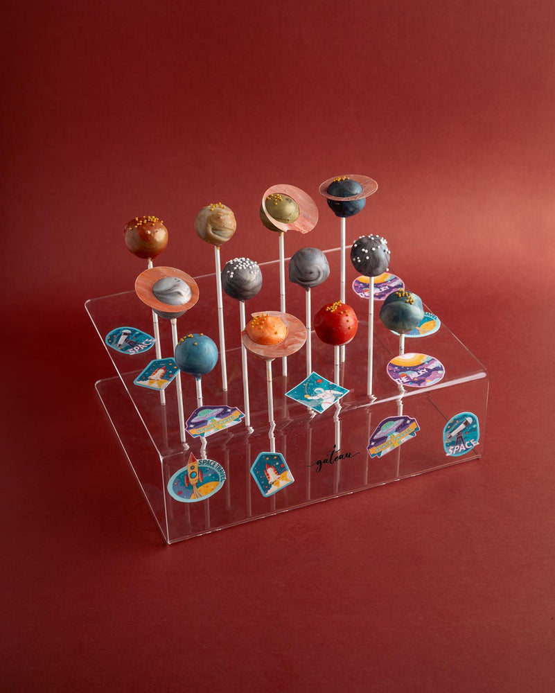 Gateau Gourmet Cafe colorful cake pops displayed on clear stand to buy cake pops for parties