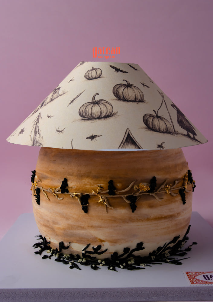 Gateau Gourmet pumpkin-themed cake with fluffy moist sponge sandwiched and elegant decorations