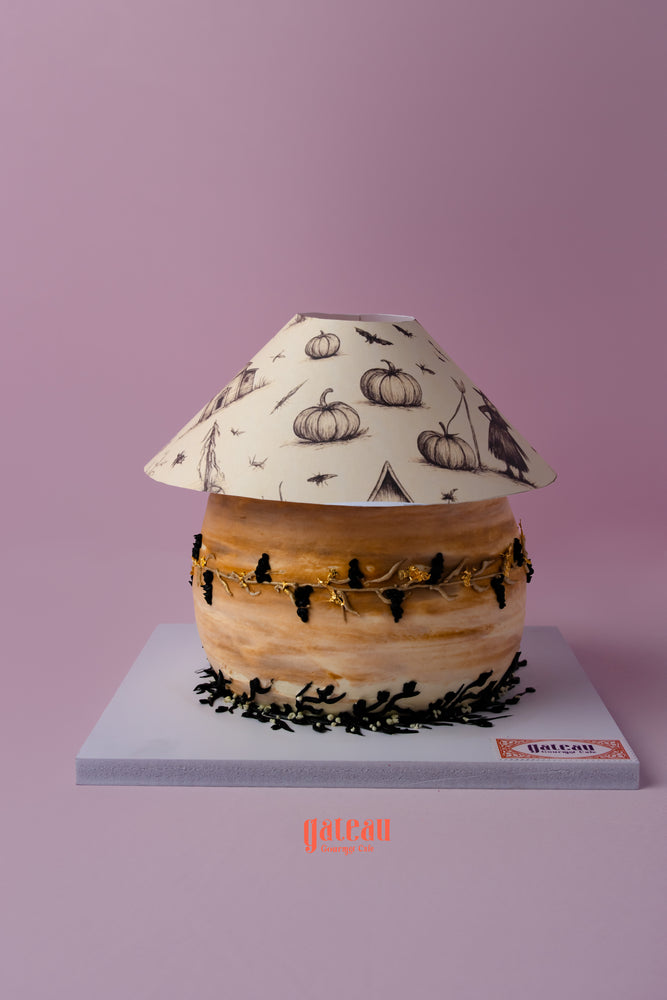 Pumpkin-themed cake by Gateau Gourmet with fluffy moist sponge sandwiched and intricate decorations