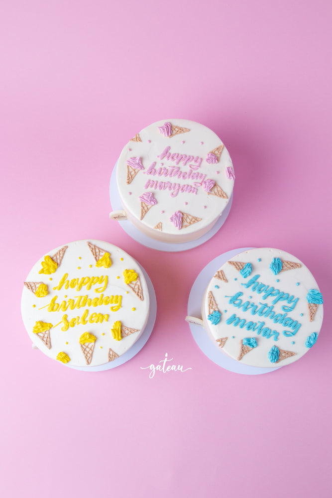 Three ice cream pastel Birthday cakes from Gateau Gourmet Cafe with colorful decorations and names
