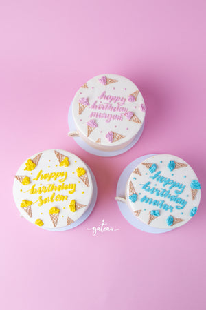 Three ice cream pastel Birthday cakes from Gateau Gourmet Cafe with colorful decorations and names