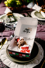 Gateau Gourmet Cafe Christmas gift bakery box with festive cookies on a decorative plate