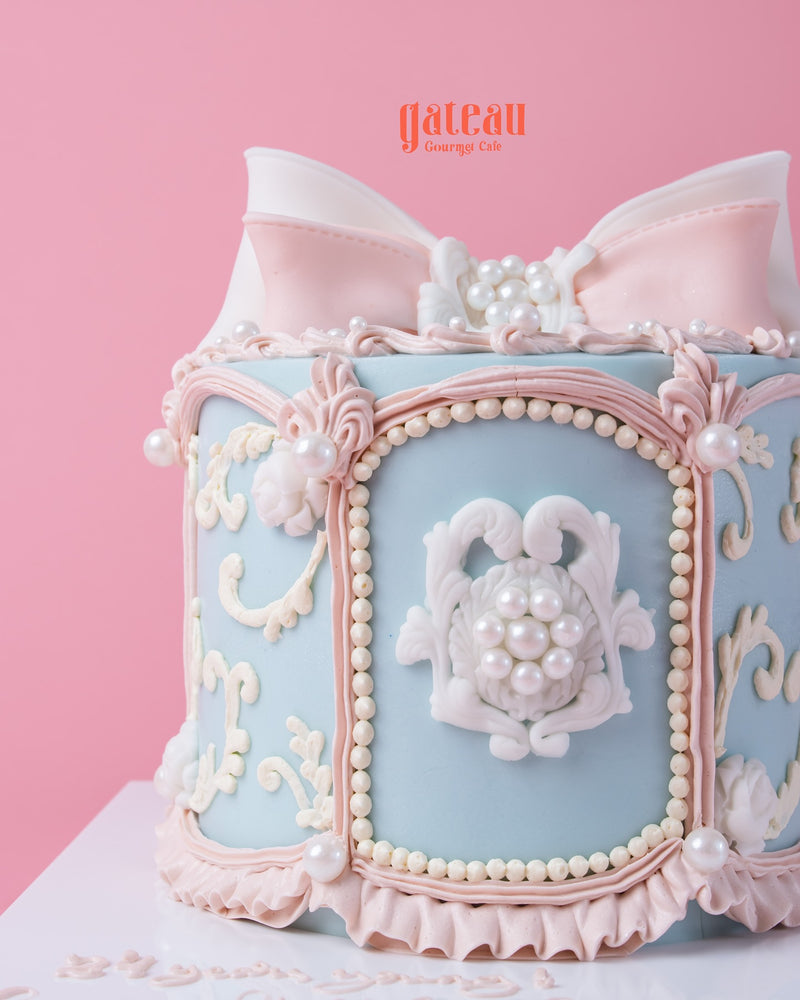 Circus Dream Carousel Cake with pastel colors and elegant pearl decorations by Gateau Gourmet Cafe