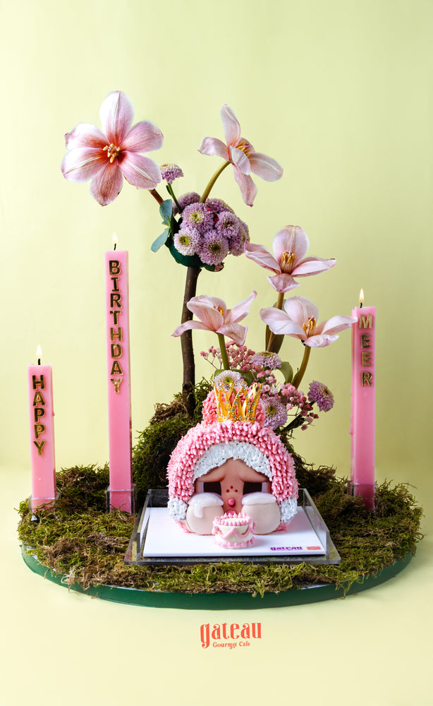Gateau Gourmet Cafe CRYBABY cake limited edition with pink floral decorations and birthday candles