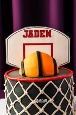 Gateau Gourmet custom basketball birthday cake with basketball and hoop decoration personalized with name Jaden