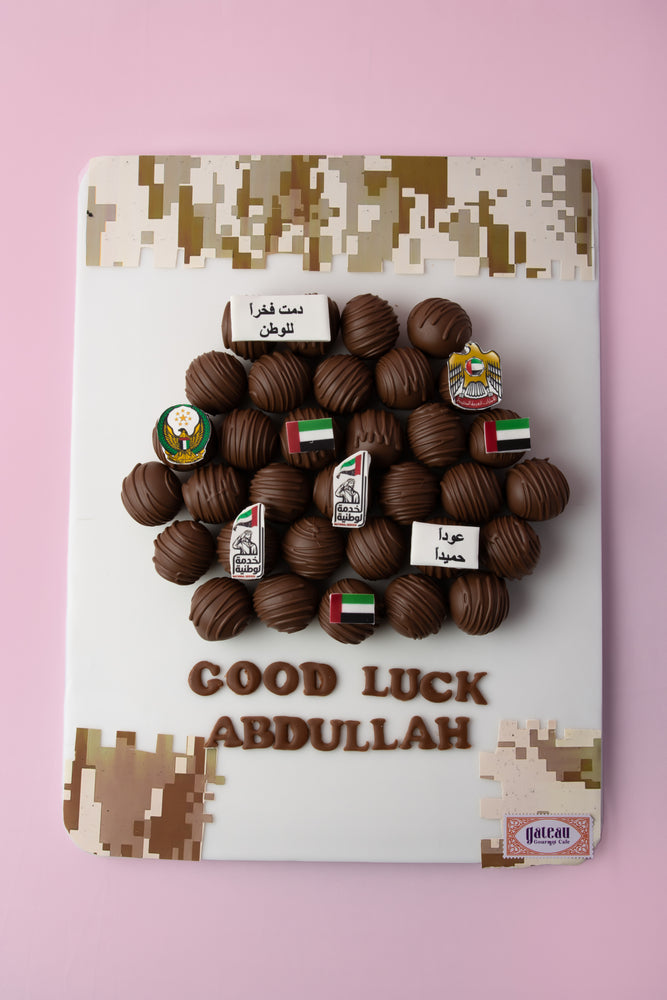 Custom chocolate truffle board decorated with messages and designs for special occasions