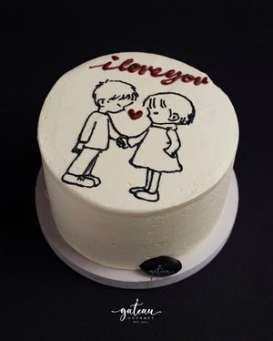 Custom romantic cake from Gateau Gourmet Cafe with cute hand-drawn couple and I love you text