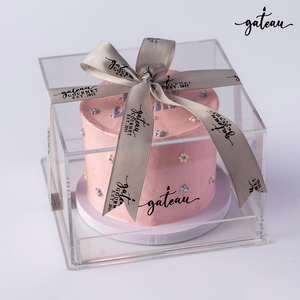 Pink birthday cake for girls from Gateau Gourmet Cafe in clear gift box with decorative bow