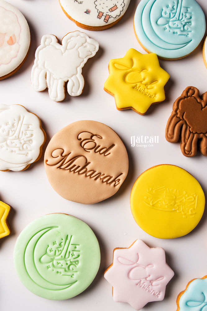 Eid Mubarak cookies by Gateau Gourmet Cafe decorated with colorful intricate designs and festive messages
