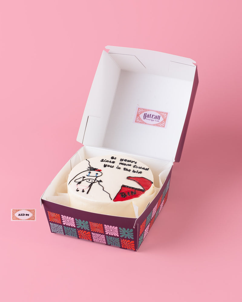 Flork cake custom design by Gateau Gourmet Cafe in a decorative purple and floral box on a pink background
