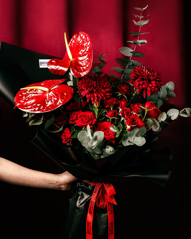 Elegant RED Flower Bouquet featuring red roses, chrysanthemums, and anthuriums with greenery