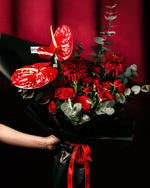 Elegant RED Flower Bouquet featuring red roses, chrysanthemums, and anthuriums with greenery