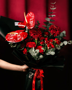 Elegant RED Flower Bouquet featuring red roses, chrysanthemums, and anthuriums with greenery