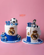 Football Theme Fondant Cake with Real Madrid logo, blue accents, and a soccer player figurine for celebrations