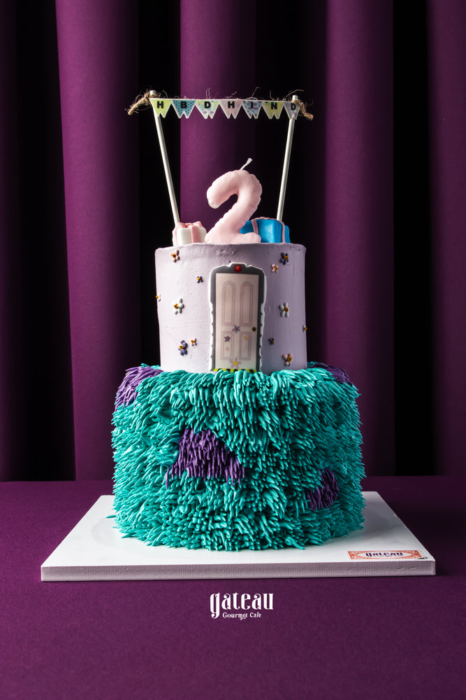 Gateau Gourmet Cafe 2nd birthday cake ideas with colorful textured bottom and purple top tier candle