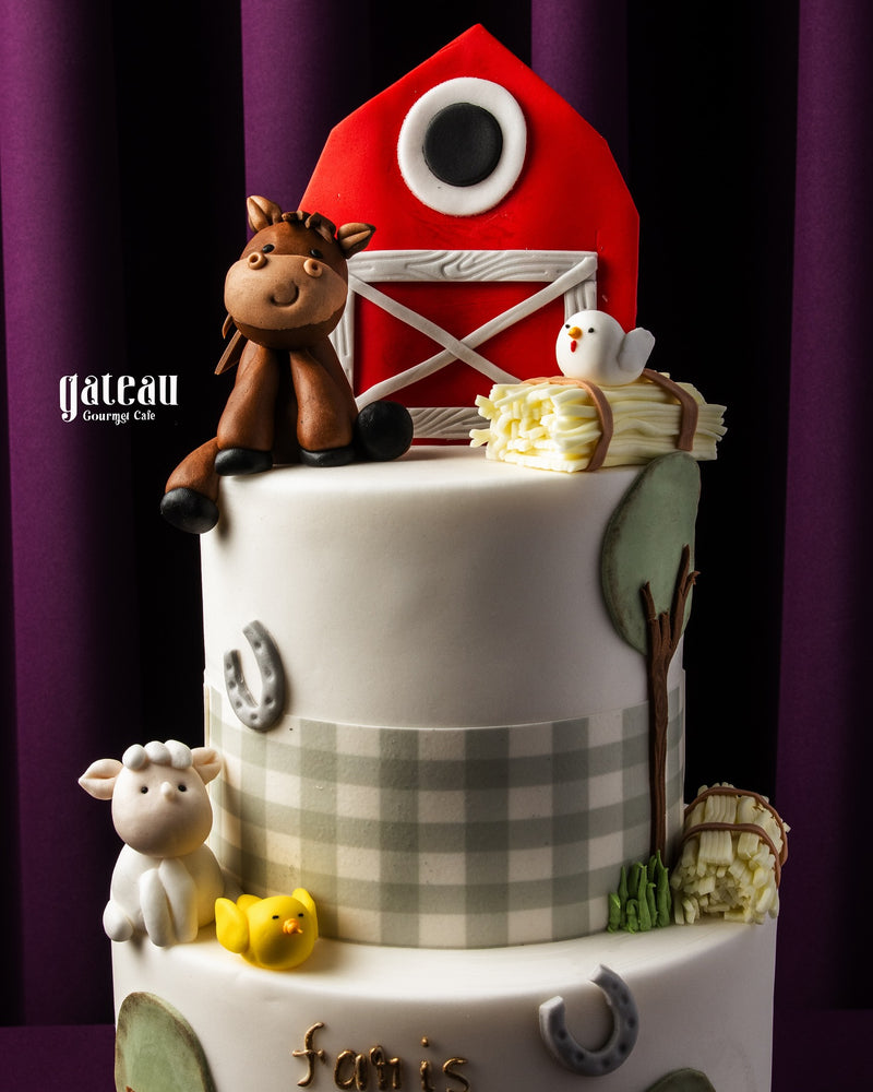 2Tier Animals Farm Themed Fondant Cake with barn, horses, sheep, and cheerful farm decorations