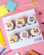 Back to school cupcakes by Gateau Gourmet Cafe featuring colorful school bus and welcome designs