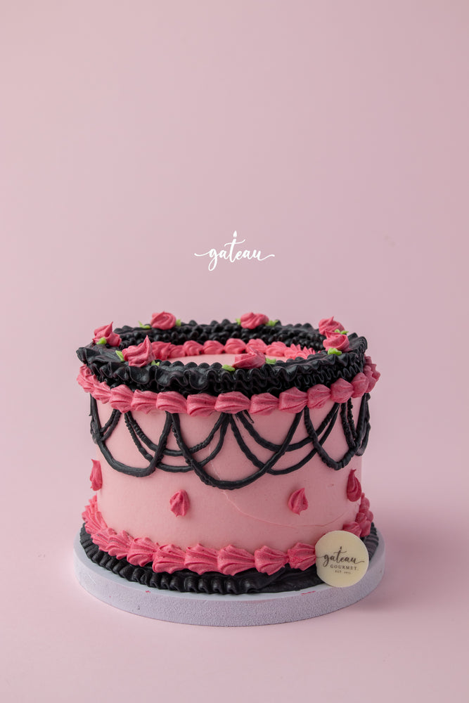 Barbie theme cake for birthdays with pink and black frosting by Gateau Gourmet Cafe
