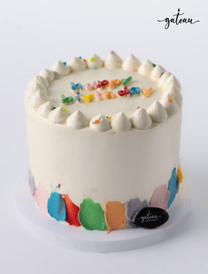 Gateau Gourmet Cafe's birthday cake with colorful sprinkles, perfect for birthday cakes delivery