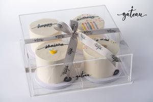 Gateau Gourmet Cafe birthday wish cake set with four small decorated cakes in clear box and ribbon