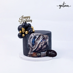 Black Suit Theme Fondant Cake with birthday decoration and elegant design from Gateau Gourmet Cafe