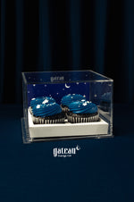 Blue frosted cupcakes for parties by Gateau Gourmet Cafe in clear star-themed display box