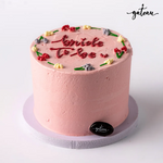 Pink frosted bride to be cake with floral decorations by Gateau Gourmet Cafe