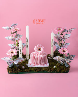 Gateau Gourmet Cafe pink cake with butterflies cake decoration gift and floral accents on moss base