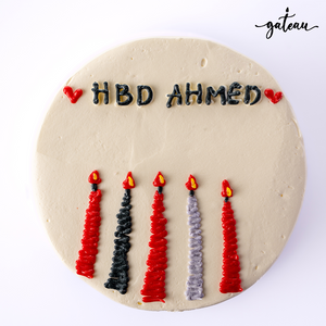 Gateau Gourmet Cafe candle bundle cake with red and black icing candles and HBD Ahmed message
