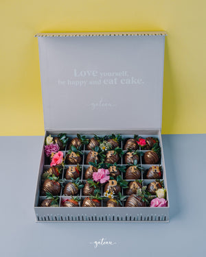 Box of Gateau Gourmet Cafe chocolate covered strawberries with decorative flowers and birthday message