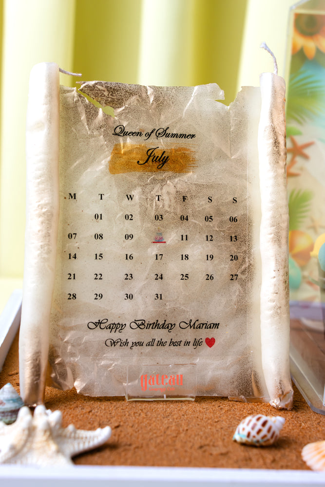Gateau Gourmet Cafe cake designed as a July calendar with beach theme and personalized birthday message