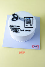 Contract cutter theme cake with scissors and a message for your loss from Gateau Gourmet Cafe