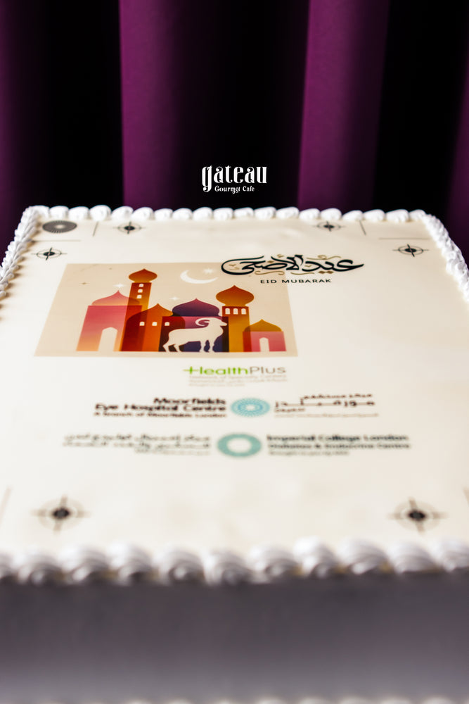 Gateau Gourmet Cafe corporate party cream cake with Eid Mubarak design and decorative white frosting border