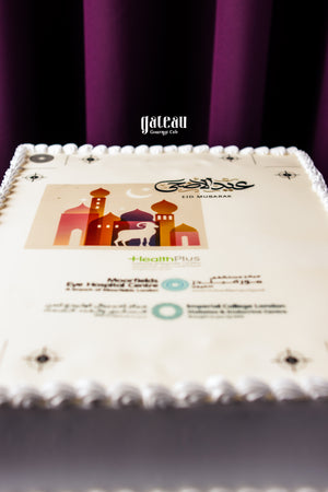 Gateau Gourmet Cafe corporate party cream cake with Eid Mubarak design and decorative white frosting border