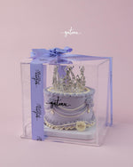 Gateau Gourmet Cafe crown cake for celebrations in purple with silver crown topper inside clear gift box