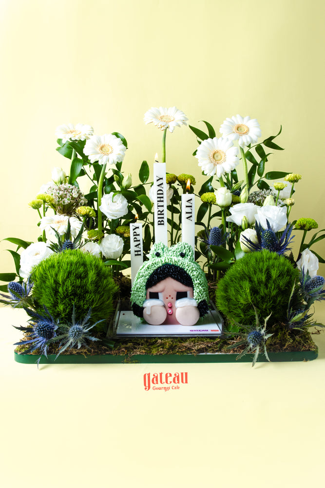 CRYBABY cake limited edition by Gateau Gourmet Cafe with intricate floral decorations and birthday candles