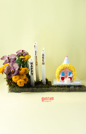 CRYBABY Powerpuff cake edition by Gateau Gourmet Cafe with decorative flowers and birthday candles