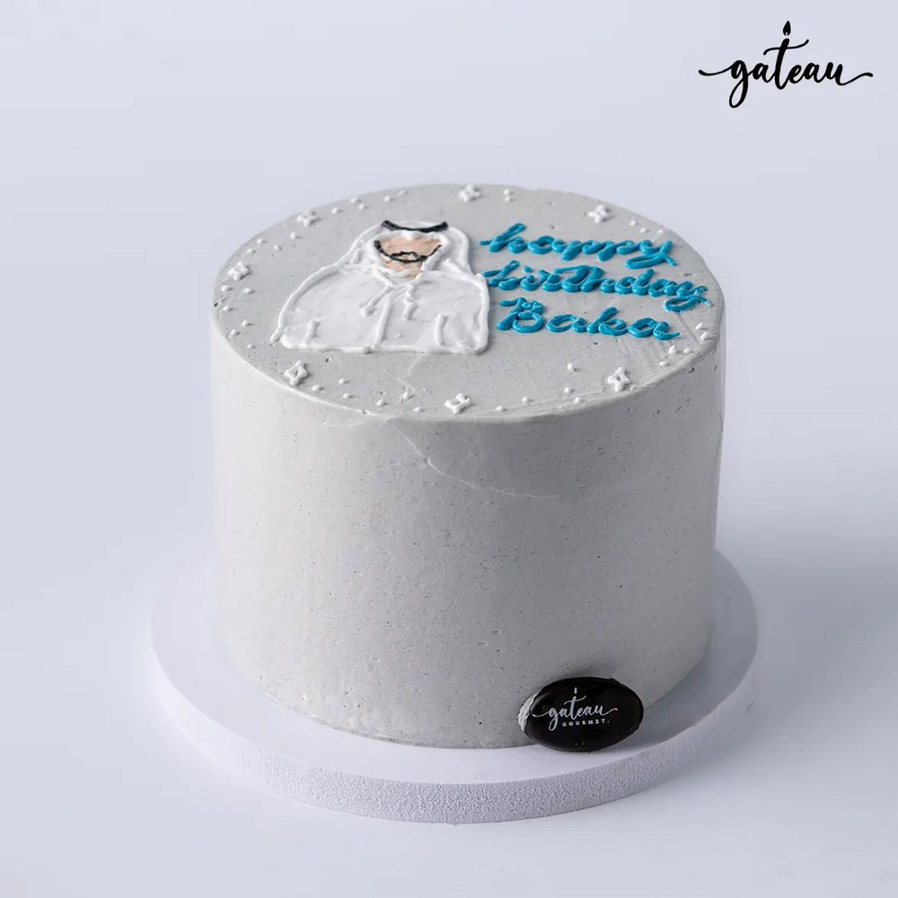 Gateau Gourmet Cafe custom birthday cake with white frosting and blue lettering on top