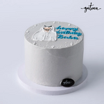 Gateau Gourmet Cafe custom birthday cake with white frosting and blue lettering on top
